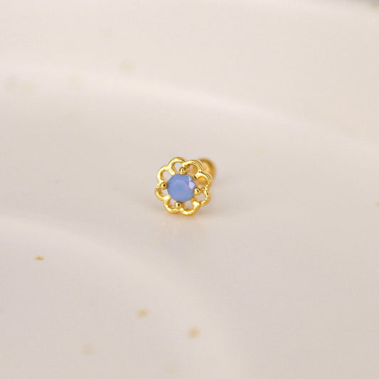 Blue flower piercing